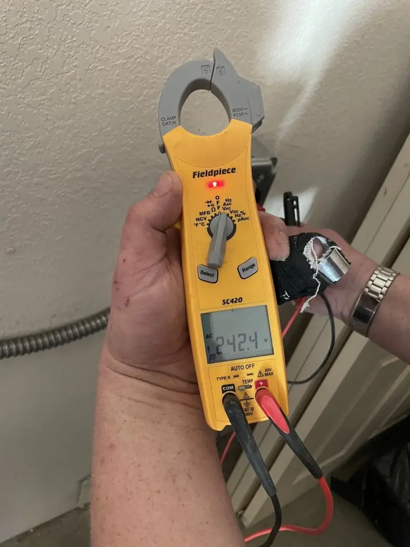 Voltage testing with clamp meter during Circuit Breaker Repair in Lake Wisconsin